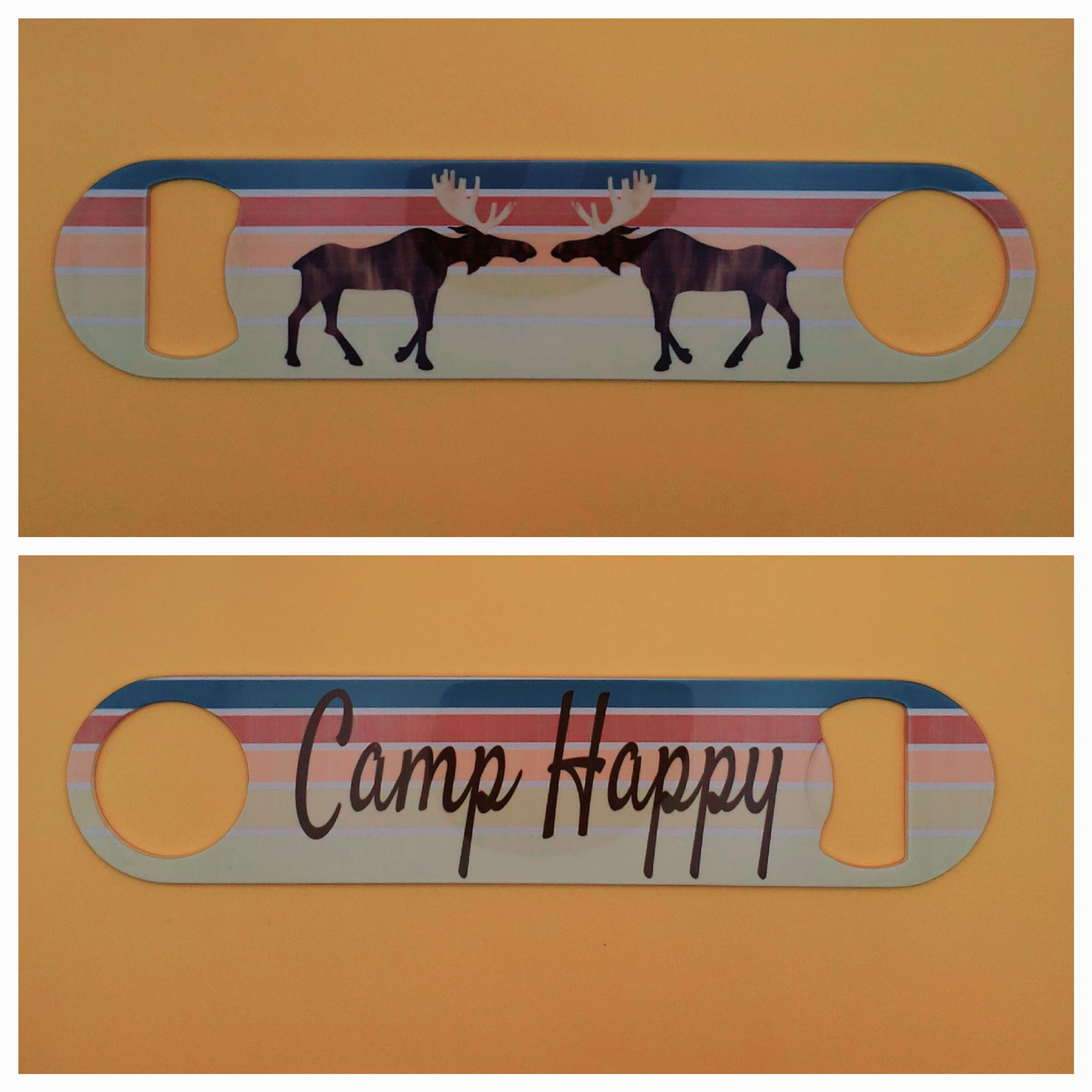 Moose on striped background with Camp Happy brand.