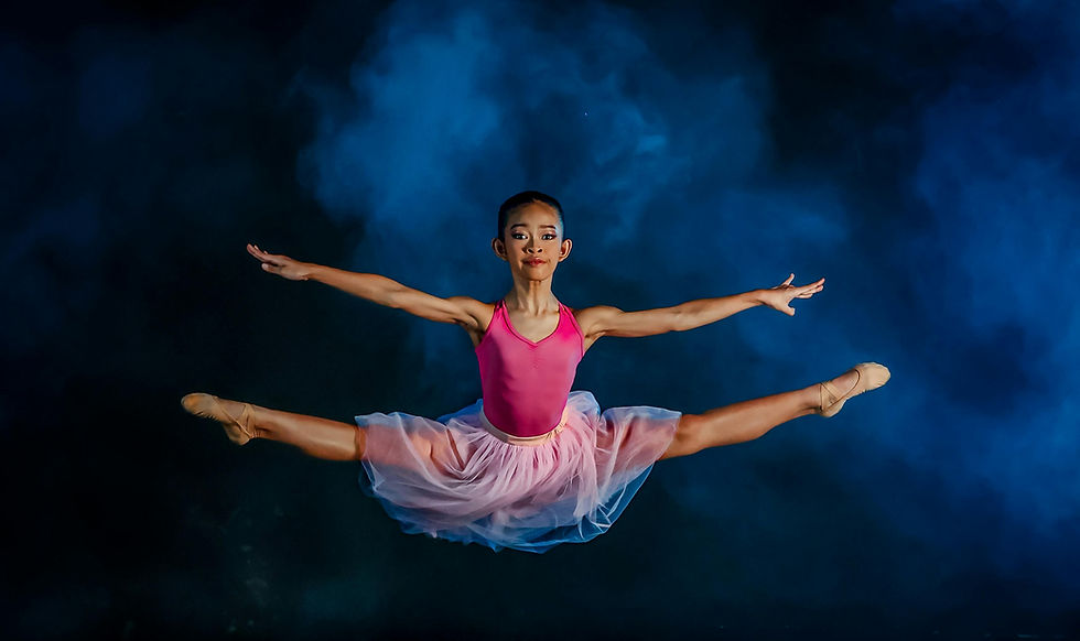 Close-up view of a dancer’s feet in motion on stage