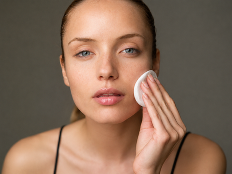 Dancer applying skincare as part of her post-performance recovery routine.