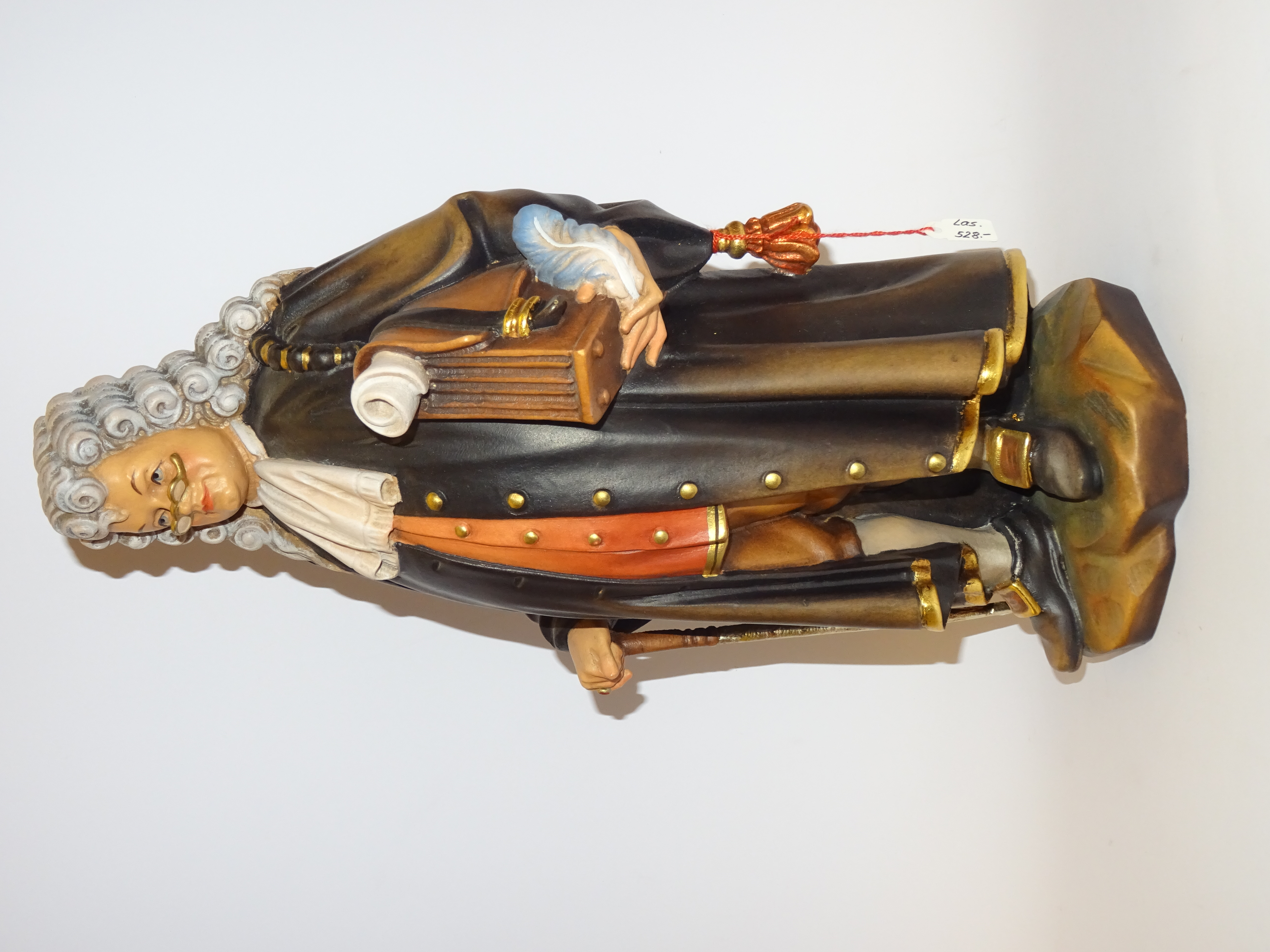 Jurist aus Holz geschnitzt