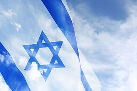 National flag of Israel and blue sky with clouds, double exposure.jpg