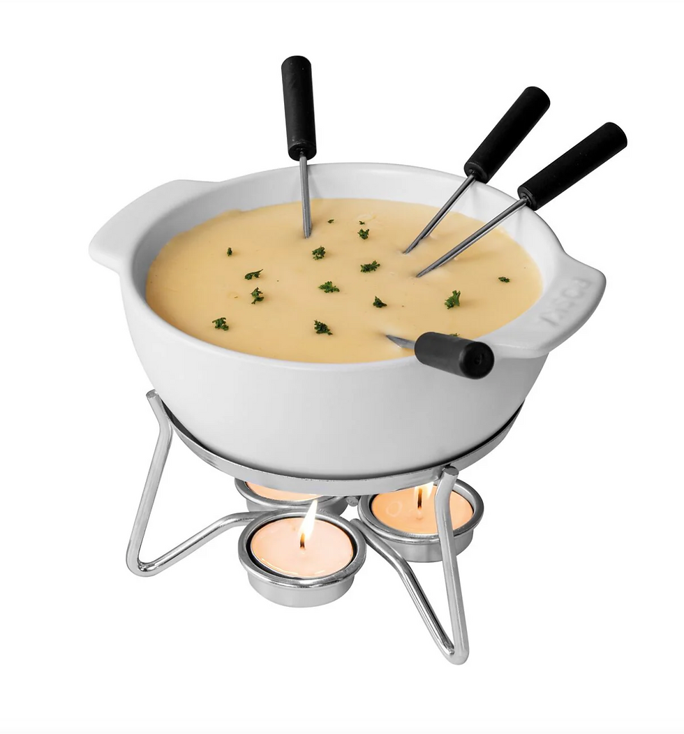 A fondue pot with four forks sticking out of the melted cheese inside the pot.
