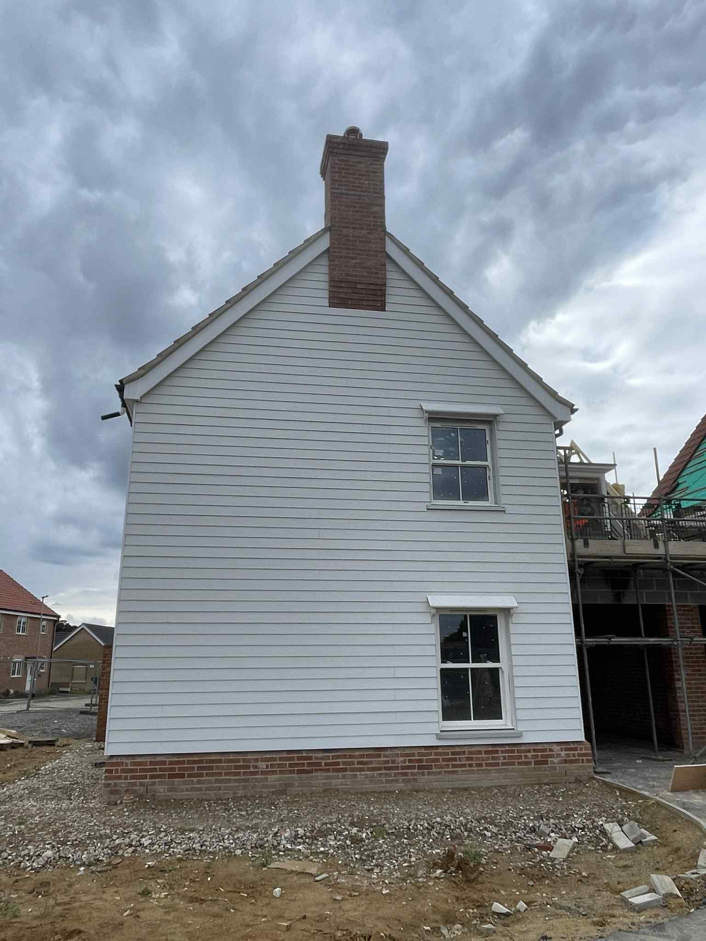 Side profile of cement board cladding installed for Hopkins Homes, Norfolk