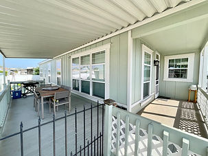 Gorgeous Newer Mobile Home with 3 bedrooms and 2 full baths in a great 55+ community.