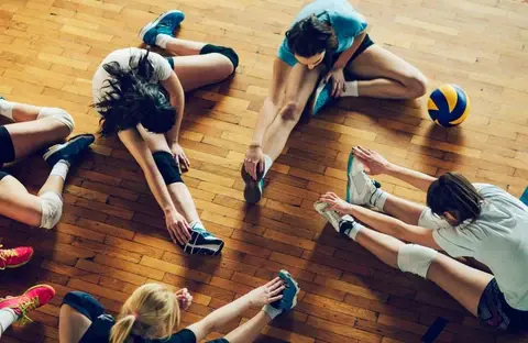 volleyball players stretching