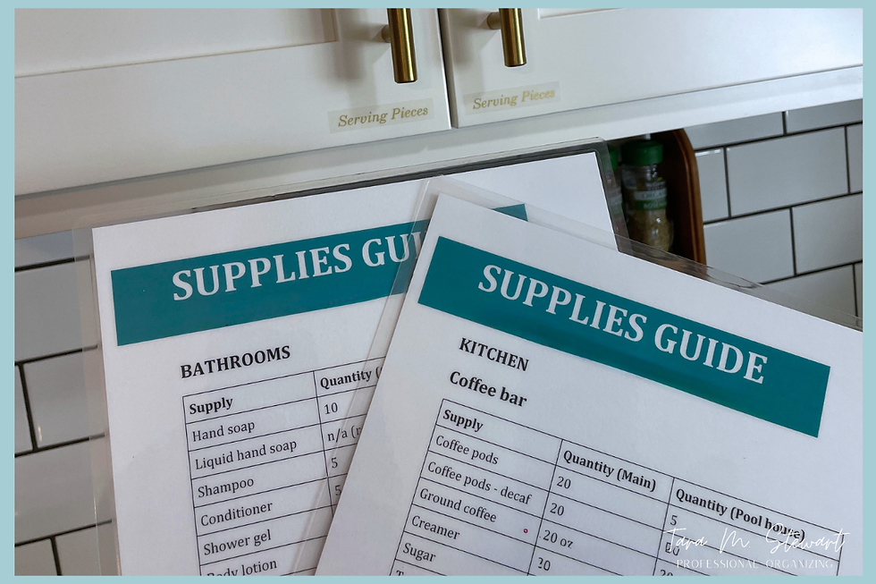 Two laminated supplies guides list bathroom and kitchen items with quantities, set on a tiled background.