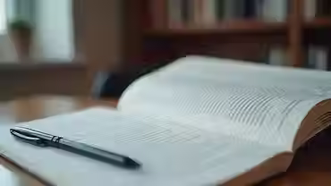 Close-up view of a psychology textbook and notes on a study desk