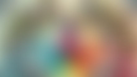 A surreal illustration of a heart at the center, surrounded by medical staff, ambulances, and clinics. Heart-shaped balloons and planes in the sky.