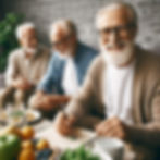 Three elderly men with beards gather around a table smiling. One writes on paper, others chat. Fruits, leaves, and snacks on table. Cozy setting.