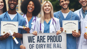 Group of diverse medical graduates in blue scrubs and white lab coats, smiling and holding diplomas. One holds a sign with jumbled text.