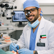 young middle eastern man prosthodontist working in the clinic
