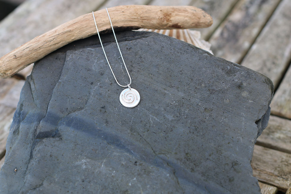 Circular motif silver necklace
