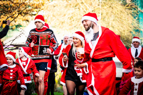 Santa run participants in festive attire