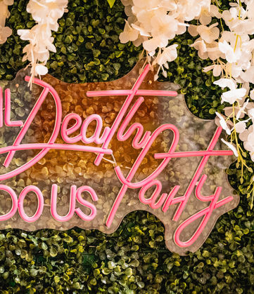 Neon sign: 'Til Death Do Us Party'