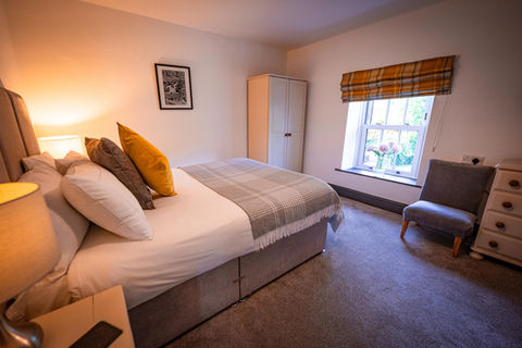 Comfortable double bed in cozy room