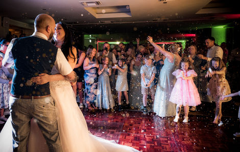 Bride and groom's first dance, confetti