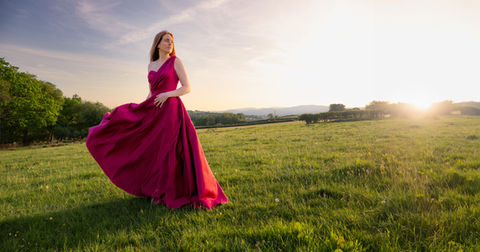 Woman in red gown, sunset Photography