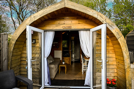 The Nook: cozy wooden cabin interior at Cherry Tree Lodges