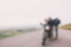 Man and women on motorbike in the welsh countryside