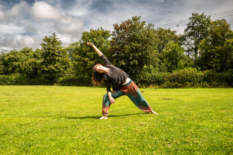 Woman performing yoga outdoors