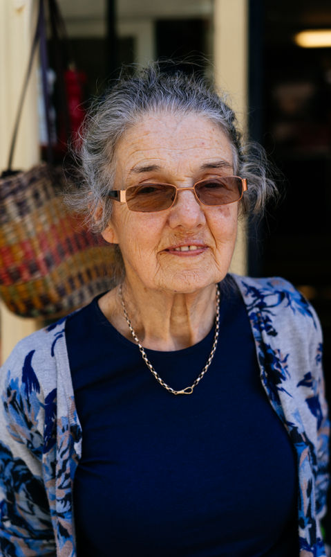 Store owner smiling for the camera