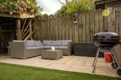 Relaxing patio furniture with barbecue