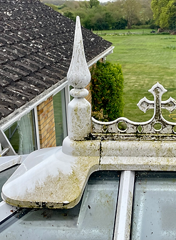 Exterior washing of a green-mould Conservatory roof