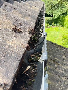Blocked gutter & outlet to downpipe