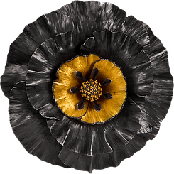 A pendant/brooch made with hand textured oxidized sterling silver and gold overlay, and 22 karat gold granulation