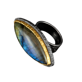 A ring with a labradorite marquise cabochon, a double silver and gold bezel, and a textured silver bezel