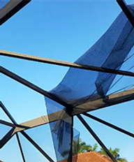 Professional rescreening of outdoor enclosures in Naples for ultimate durability.