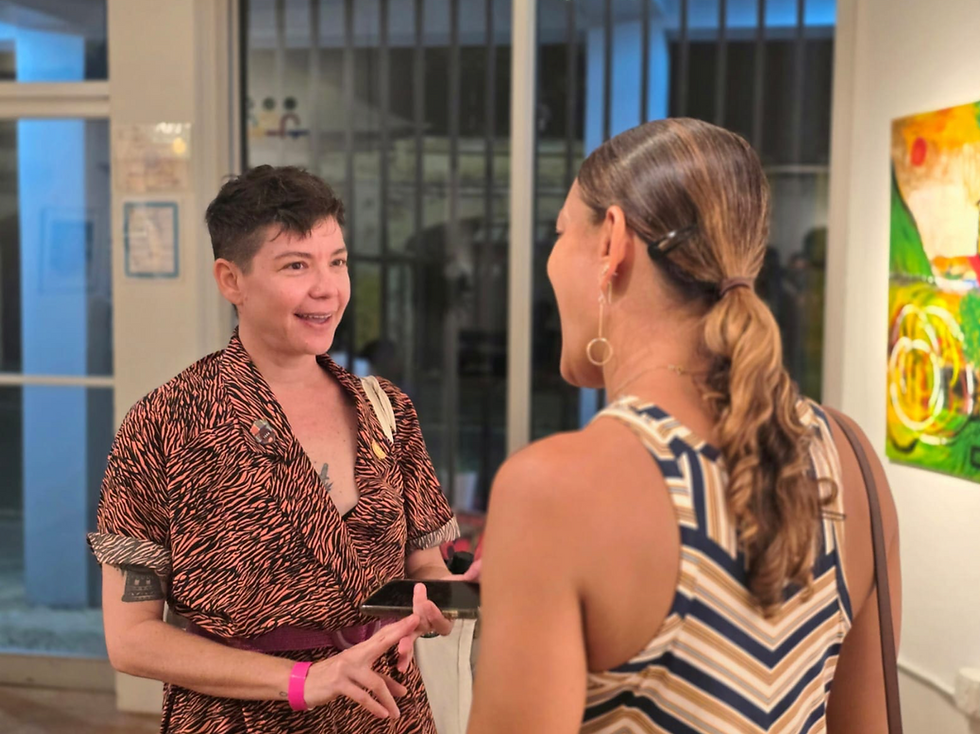 Gena Saroogy (left) and Nicole Canegata (right), featured photographers at “Bridges” at Cane Roots Art Gallery in downtown Christiansted, St. Croix, USVI. (Source photo by Shanell Petersen)