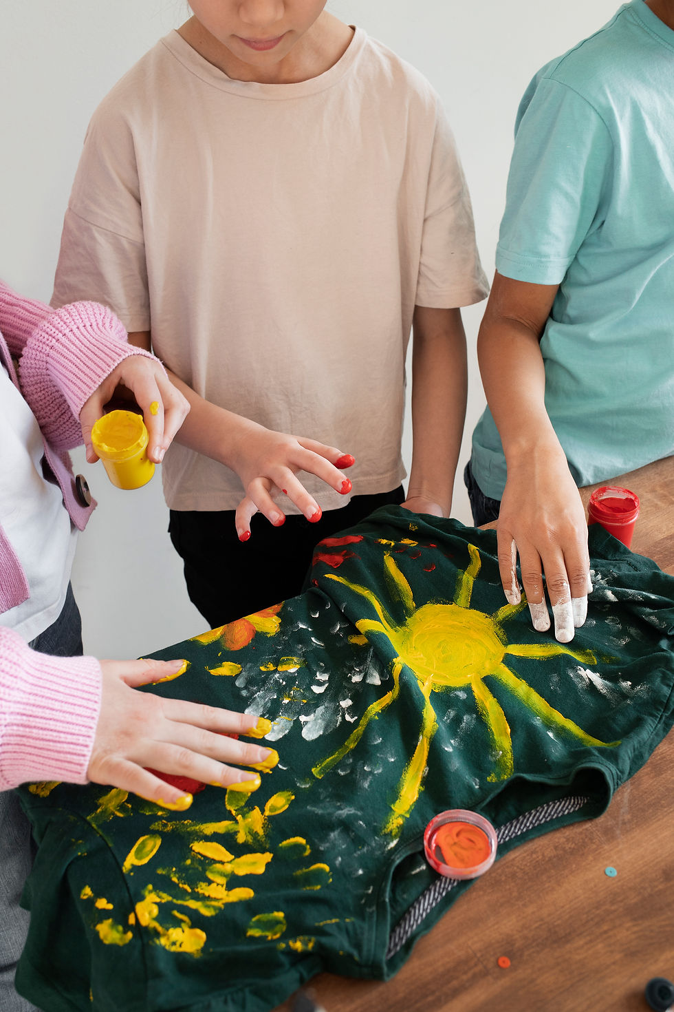 young-children-making-diy-project-from-old-t-shirt.jpg