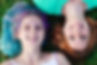 two-happy-cheerful-young-lesbian-girls-lying-grass-park-top-view-pretty-teenagers-with-col