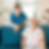 smiling caregiver nurse and elderly woman