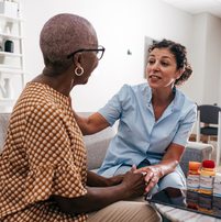 elderly woman with caregiver