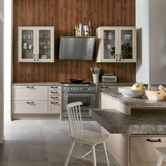A modern storage unit featuring dark wood sliding upper doors that reveal interior shelving over white lower drawers with sleek handles