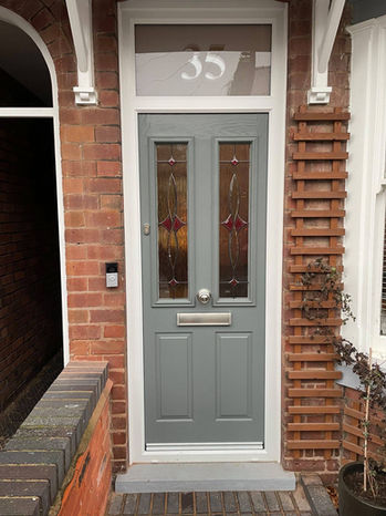 Gray front door with glass