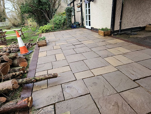 Clean stone patio area outside residential building