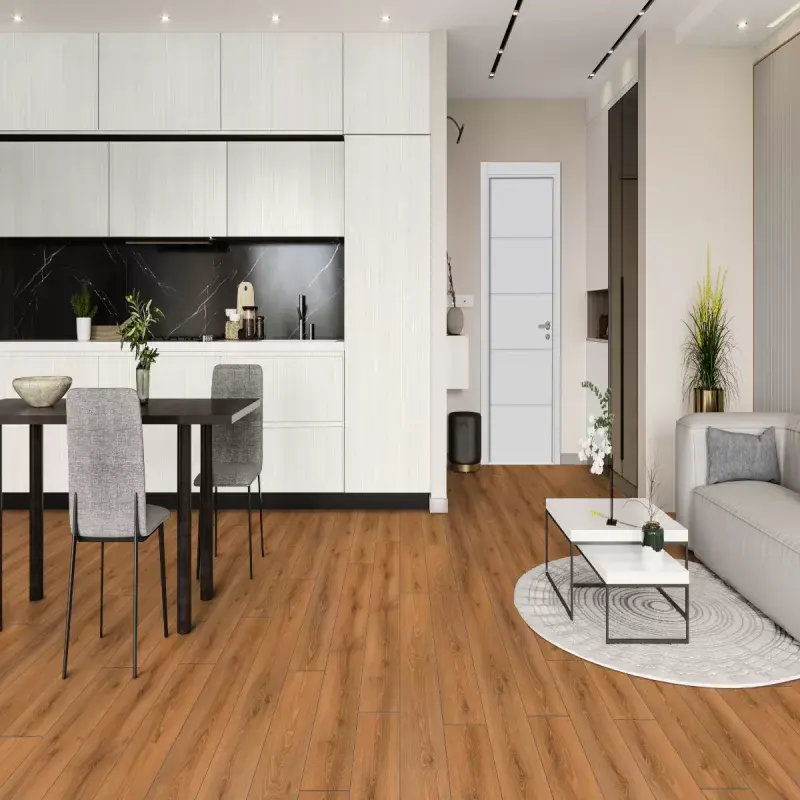 Modern open-concept kitchen and living space with sleek white cabinets