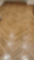 brown herringbone ceramic tiles on floor
