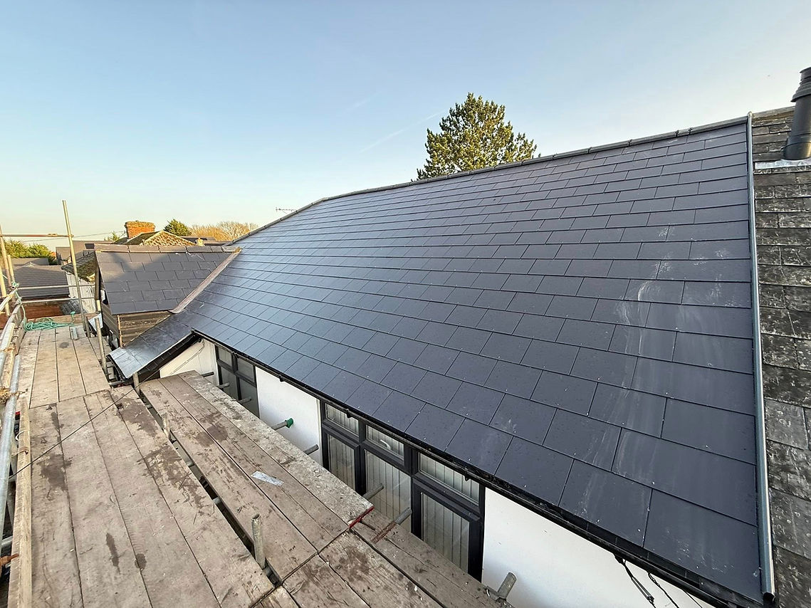 A roof featuring a sleek black metal design, showcasing a modern and durable architectural style