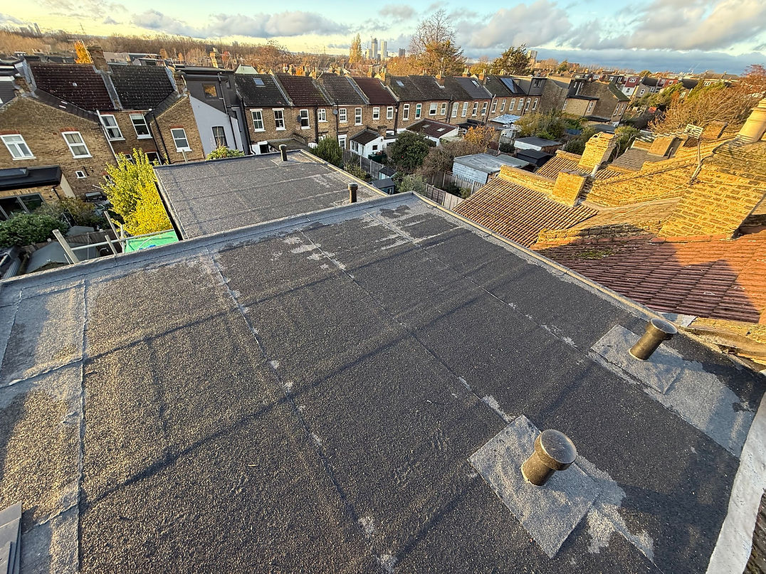 A flat roof structure, showcasing a smooth, level surface without any slopes or angles