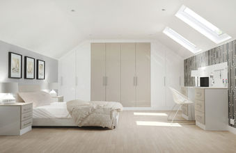 Sleek, ultra-modern handleless kitchen blending matte white and dark woodgrain cabinets