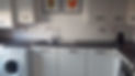 kitchen with glossy white metro tile splashback