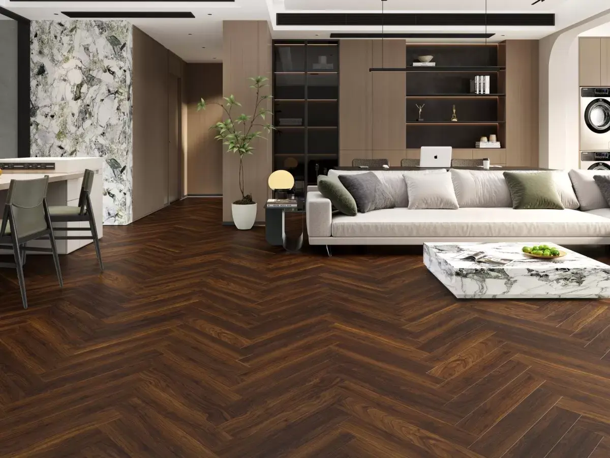 Modern living room with dark herringbone wood floor, beige sofa, marble coffee table