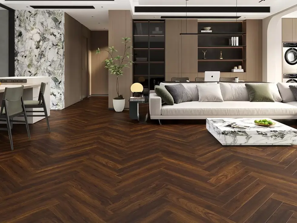 Modern living room with dark herringbone wood floor, beige sofa, marble coffee table