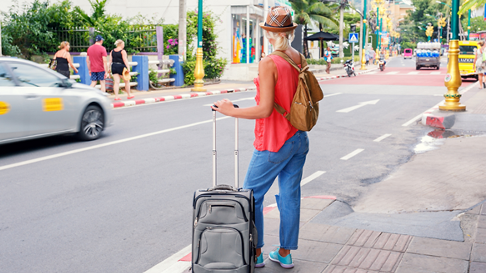 Backpacker waiting for transportation