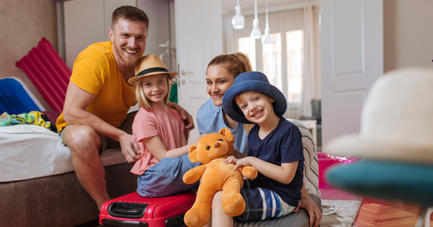 A family of four getting ready for vacation