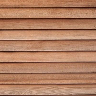 Horizontal wooden siding texture background. Siding Replacement for a house exterior.